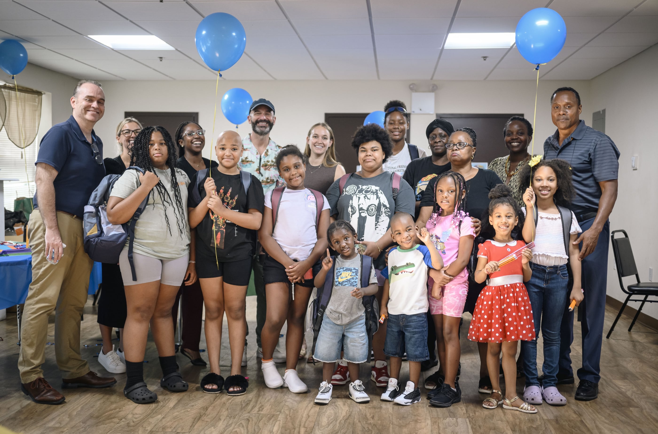 Belveron Donates and Distributes Backpacks and School Supplies in Harlem